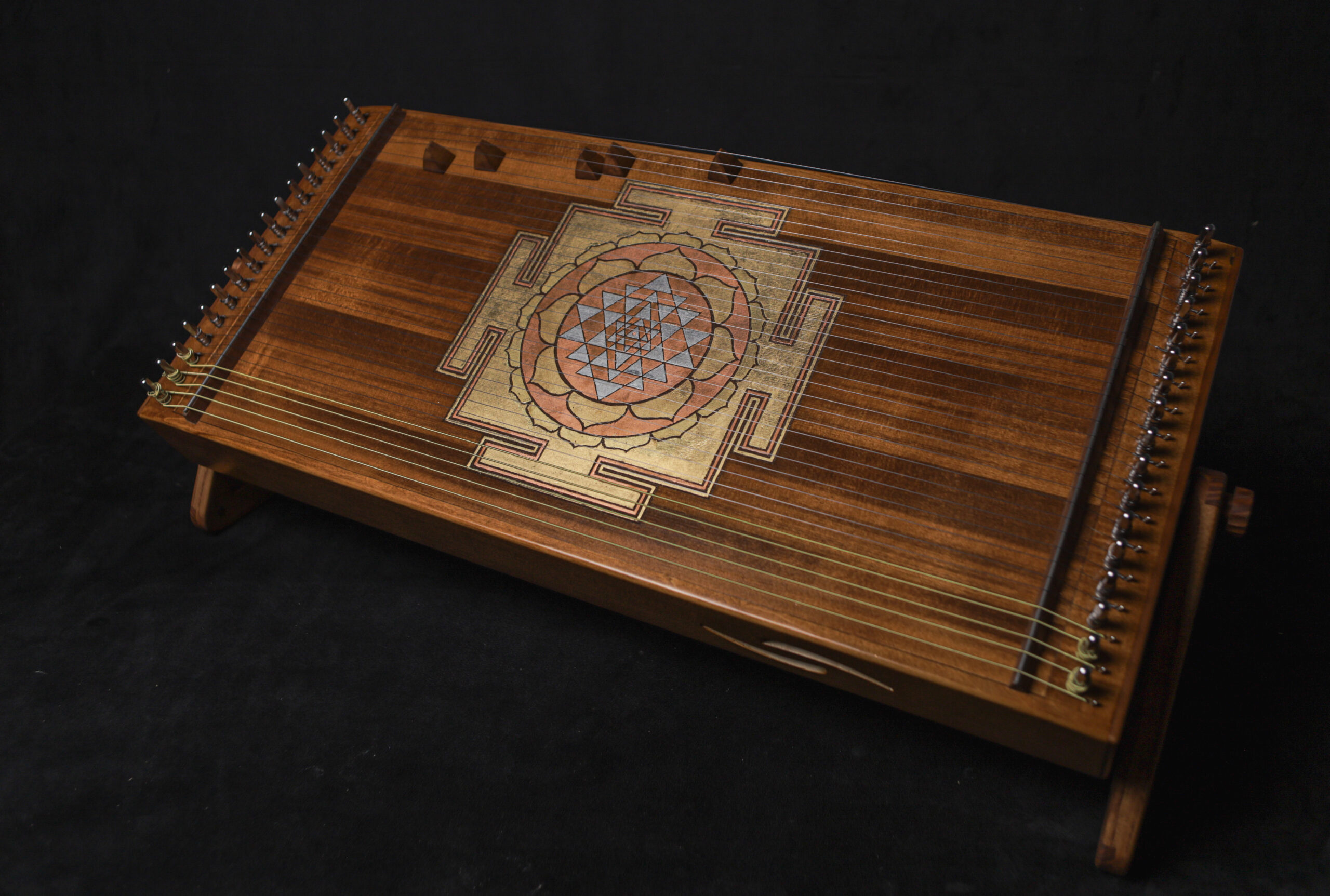 Monochord 34 strings with  Srī Yantra power